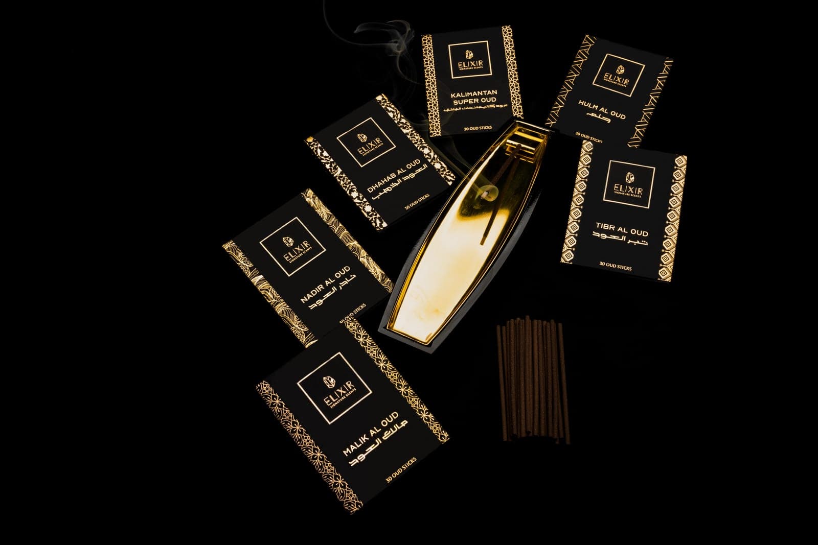 Elixir oud incense boxes with the gold holder