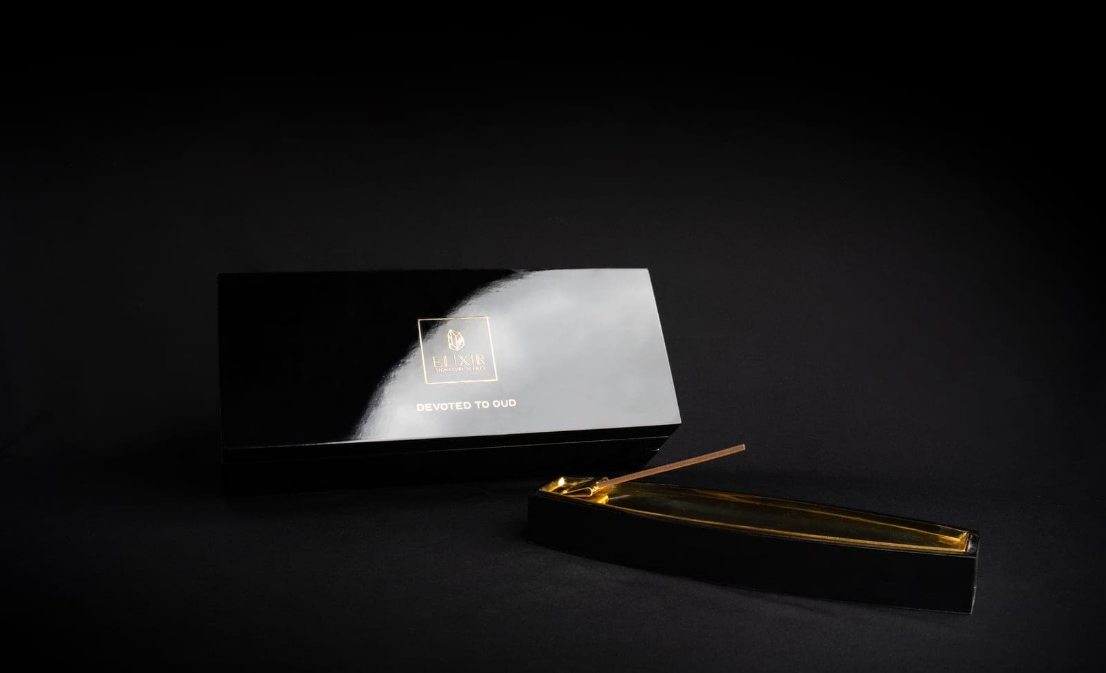 The long gift box with the gold holder