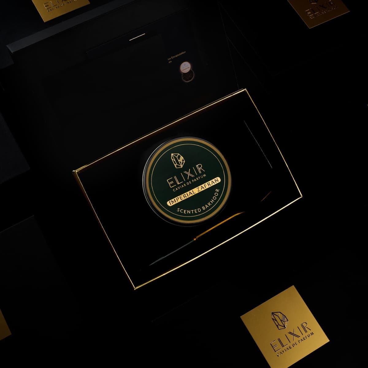 The Imperial Zafran box open, the green tin seated inside beside its spoon
