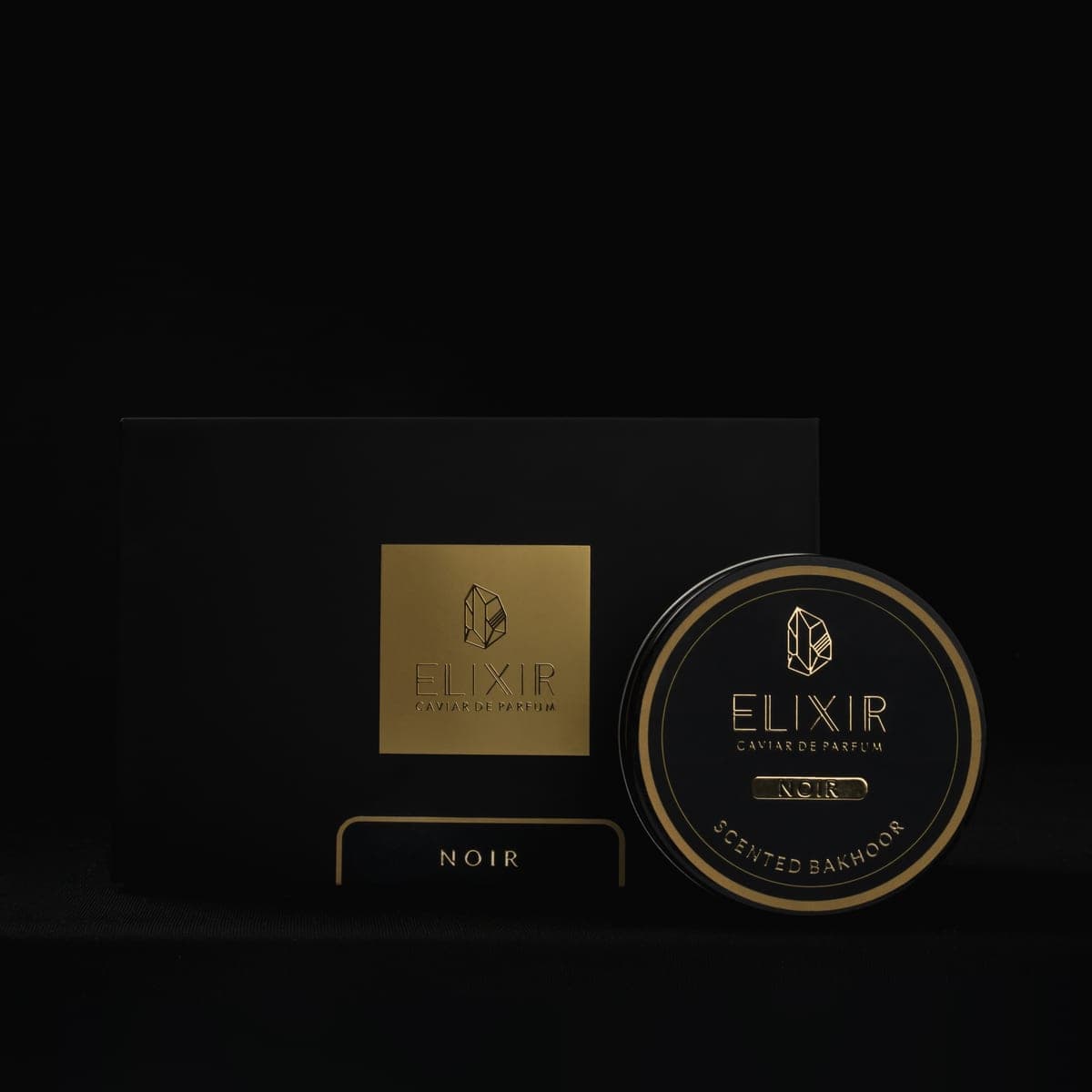 The Noir box and tin, front on