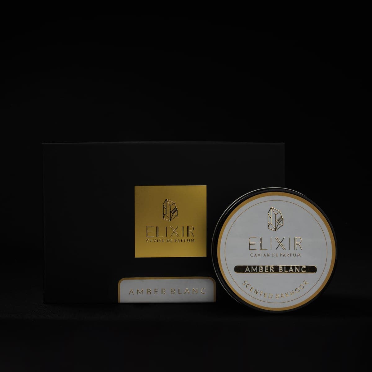 The Amber Blanc box and tin, front on
