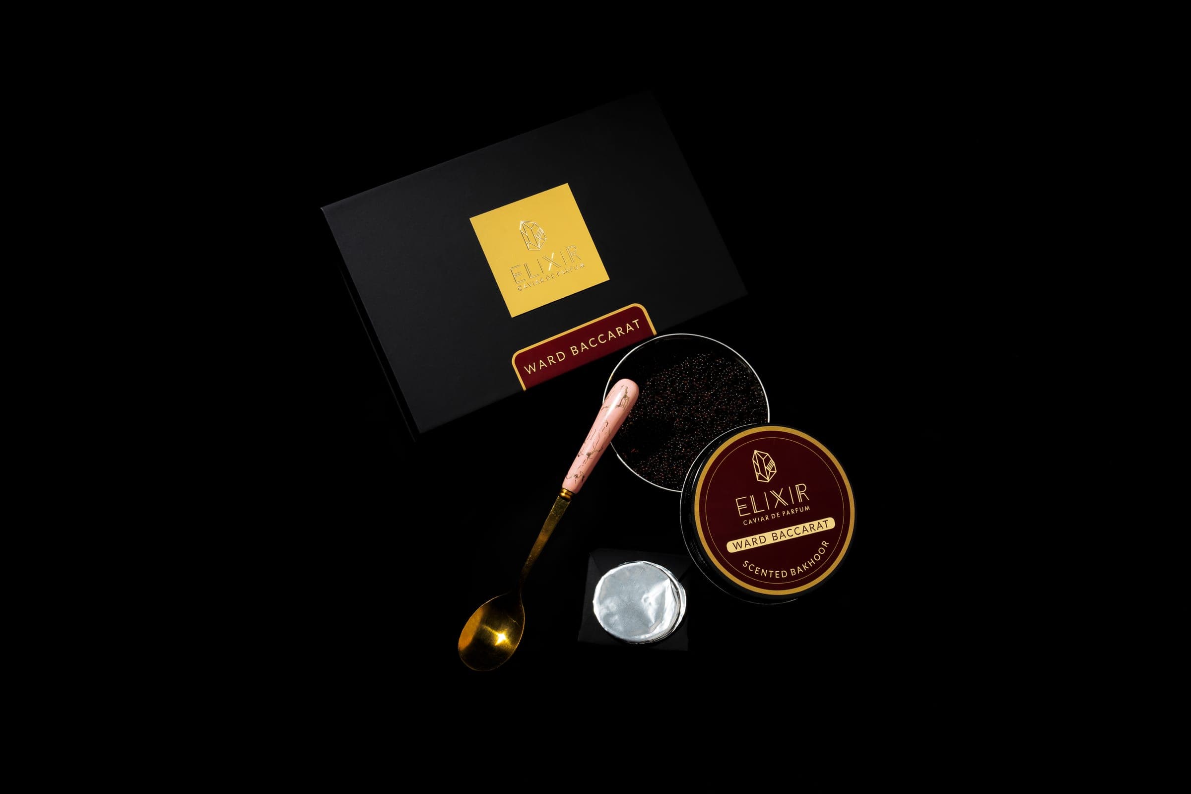 The Ward Baccarat box, the open tin, the spoon and a disc of foil